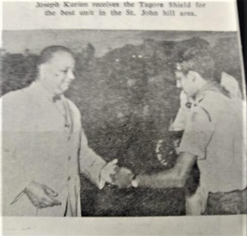 Scouts Trophy being received by Joseph